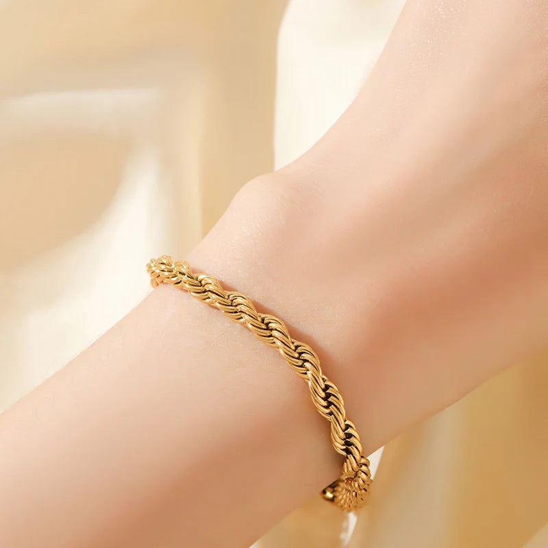 Bracelet jonc en acier inoxydable 316L couleur or pour femmes.