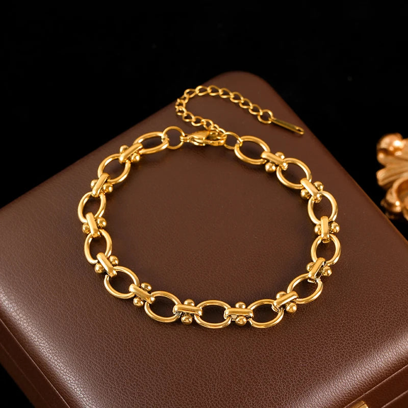 Bracelet en métal en acier inoxydable femmes plaquée or 18 carats.