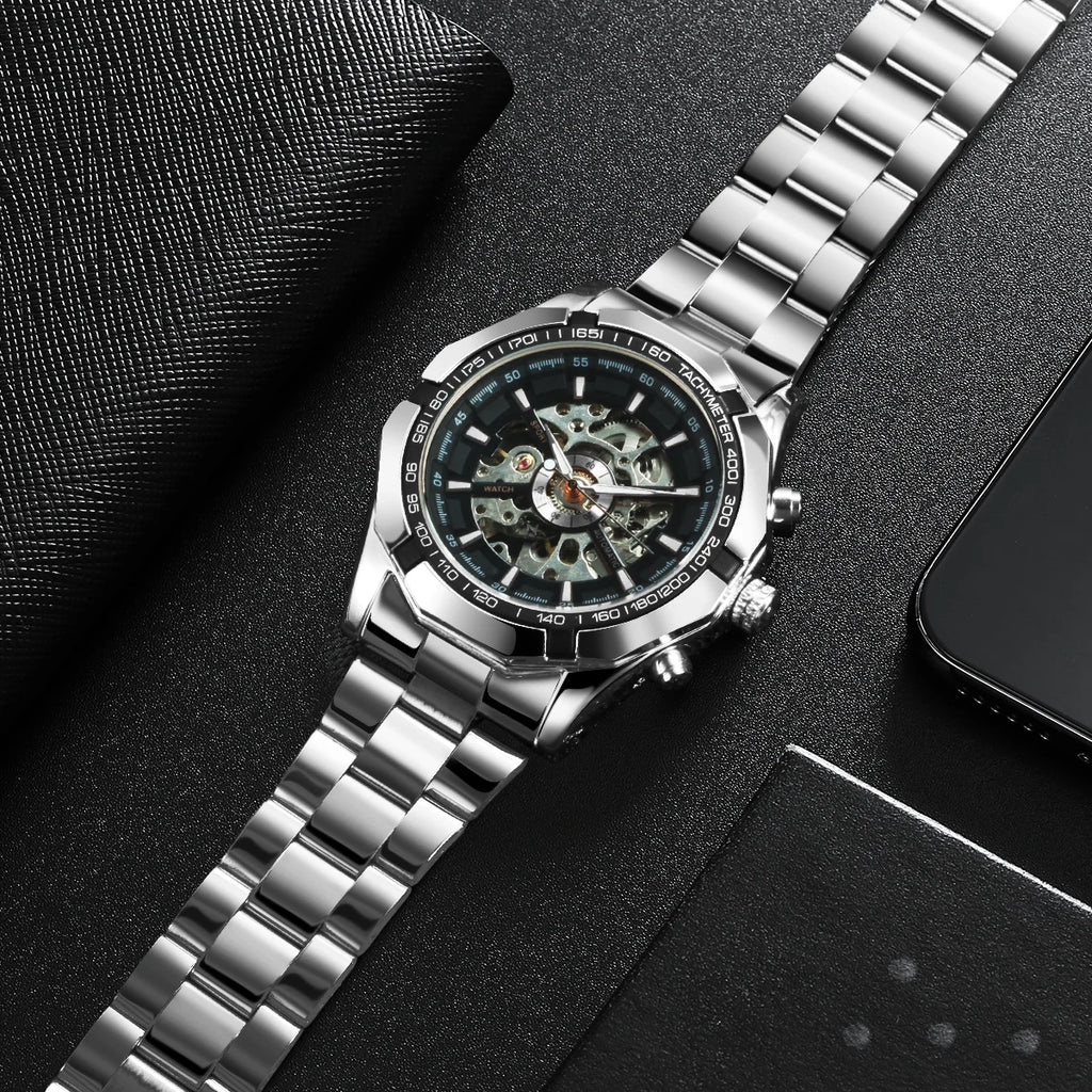 Montre Mécanique Squelette Homme WINNER – Aiguilles Lumineuses, Bracelet Acier