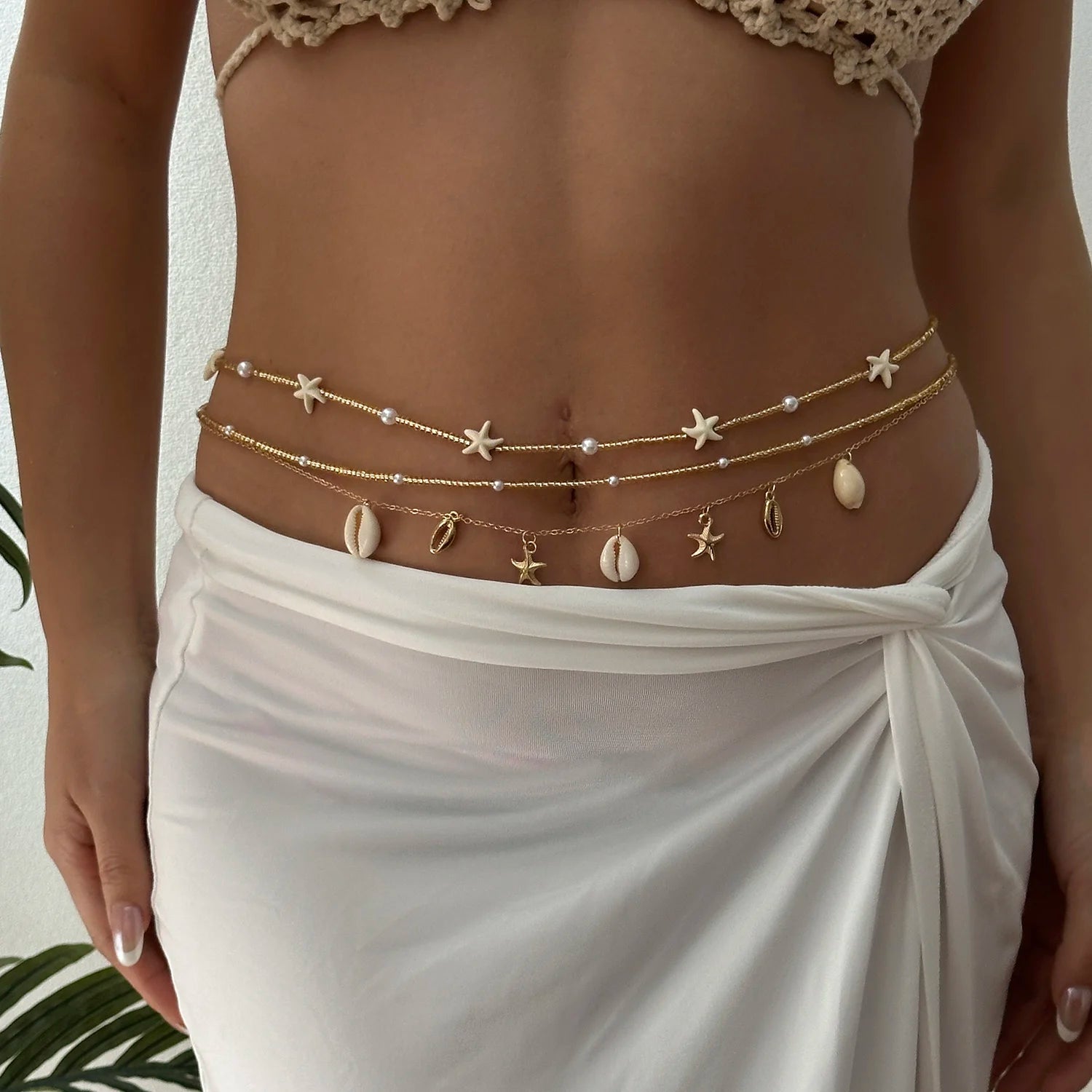 Chaîne de taille bohème tendance pour femme avec pendentifs étoile de mer, coquillage, tortue, papillon et perles de riz, bijou de corps pour fête de plage